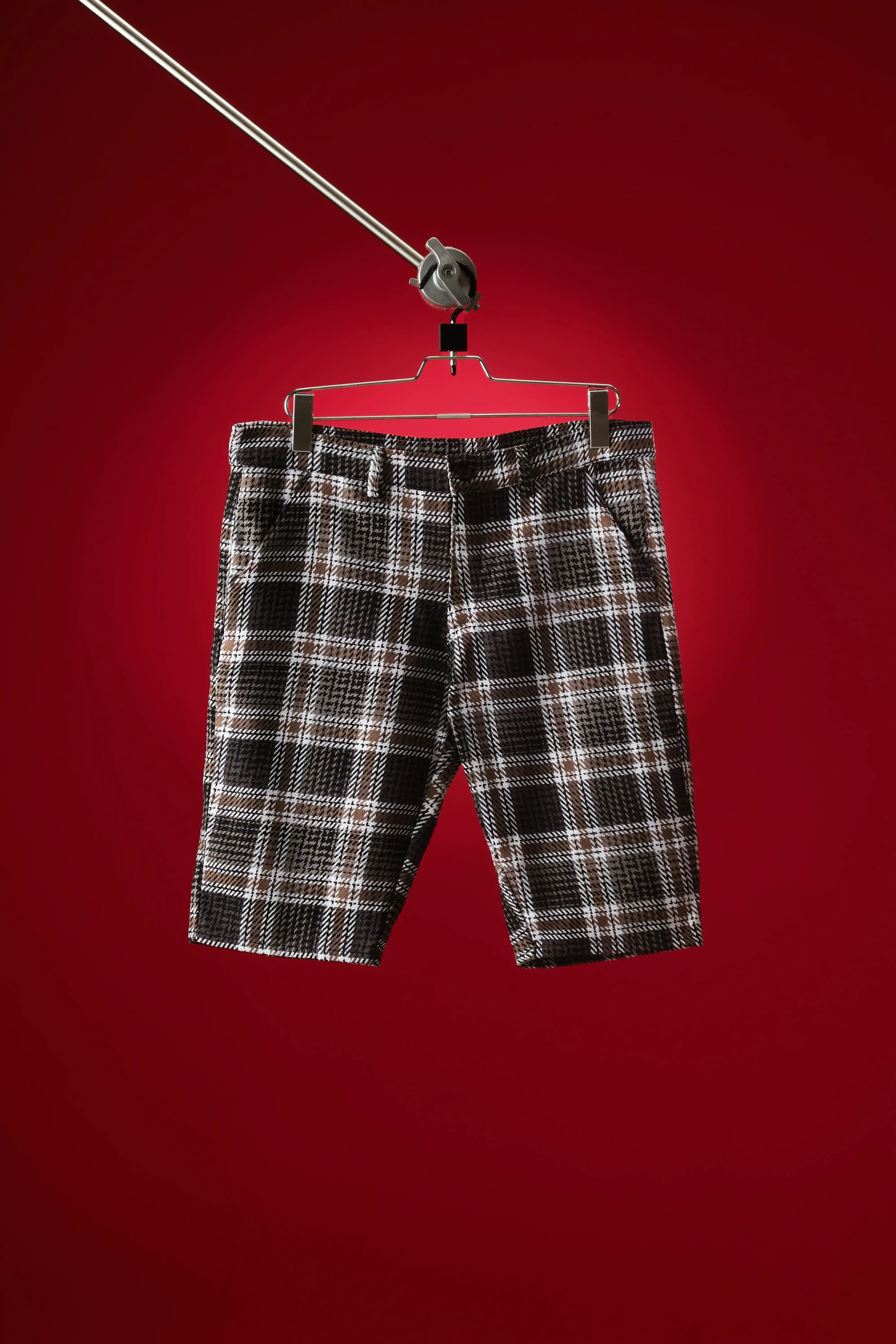Black and white waffle check shorts with tailored fit, summer casual wear for men.
